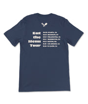 The back of a navy blue shirt with a list of tour dates and locations for the Eat the Menu tour. From the Try Guys.