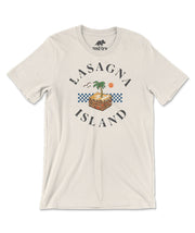 A off-white t-shirt with a design of a piece of lasagna depicted as an island with a palm tree sprouting from its center. The lasagna is surrounded by birds and an orange sun in the distance. The design has text that reads, "Lasagna Island". From the Try Guys.